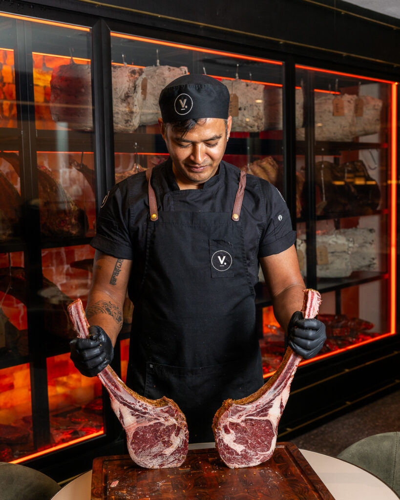 Dry Aged Tomahawk Discover the Benefits of Dry Aged Meat at Volcanos Steakhouse